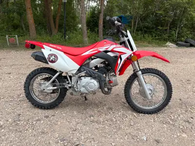 Easy bike to learn on,has electric and kick start and also has an ignition (with a key)