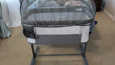 Gray adjustable baby bassinet sleeper with mosquito net, View more