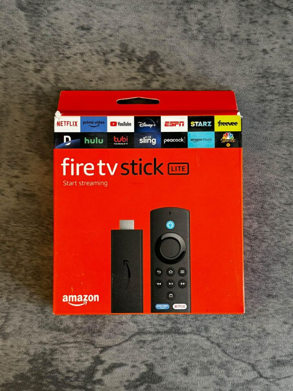 Amazon Fire Stick lite 2e gen avec télécommande vocal NEUF dans Appareils électroniques  à Laval/Rive Nord