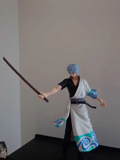 This is a used Gintama action figure of Sakata Gintoki, from the Gintama anime series. The figure is...