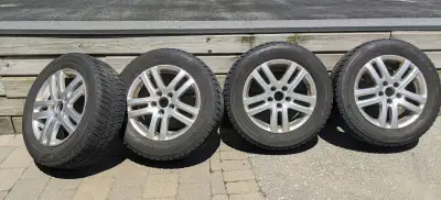 Bridgestone Blizzak Snow tires on 215/60 R16 rims. Good condition Also can use on VW with low profil...