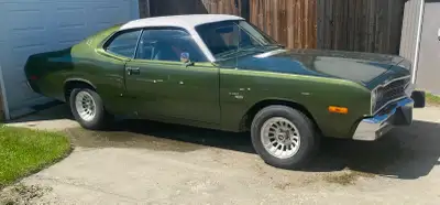 318 V8, 4 barrel carburetor 4-speed manual, Hurst pistol grip shifter Owned since 1990 Still drives...