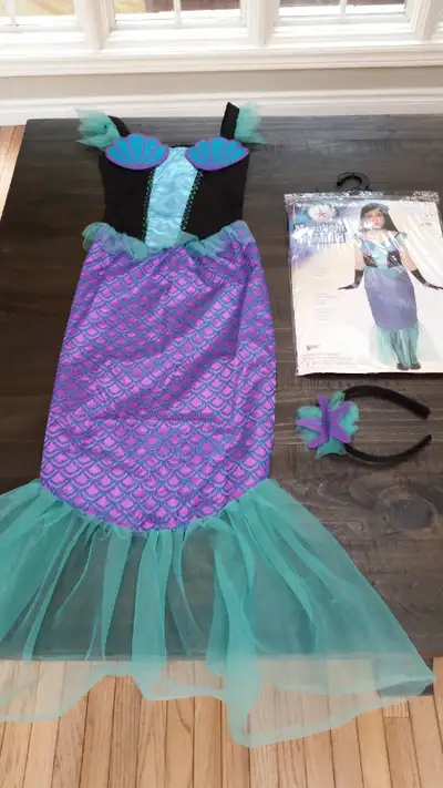 Moonlight Mermaid halloween costume for girls age 8 to 10. Our daughter has outgrown her costume so...