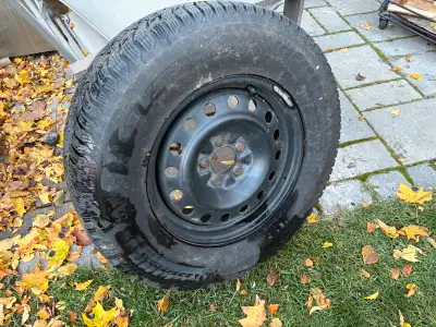 Snow tires lots of tread, steel rims, 2001-12 escape. 4 tires and rims 235/70 R16