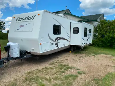 Spacious, lightweight, well built trailer with two entries. Trailer has never leaked, roof is solid...