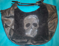 Women's pleather and suede skull purse