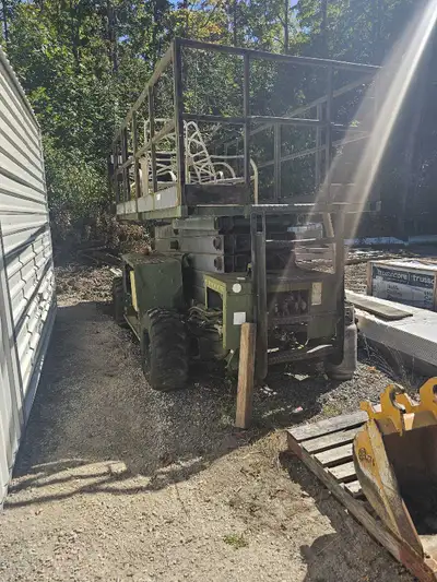 Grove scissor lift. Was running when it was parked. Propane or gas. As is where is. Open to offers.