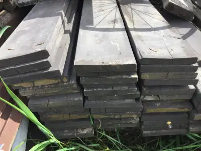 Massive collection of fence boards. Only 15-40 cents per foot depending on condition. The price at H...