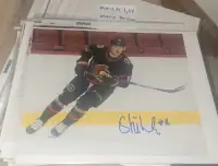 Tim Stutzle signed 8x10 photos and puck Senators Hockey