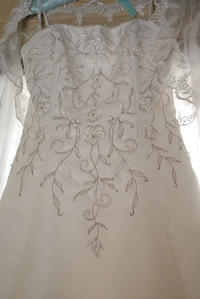 Ivory Wedding Gown, laced back adjusts sizes 12-15.