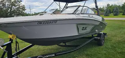 2022 glastron gx215 sport, under 60 hours, well maintained, always winterized, comes with trailer an...