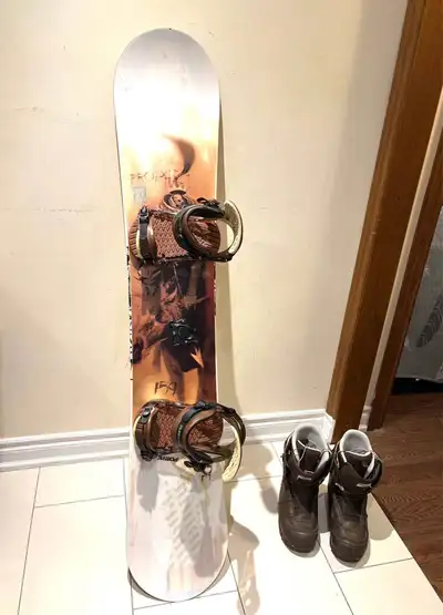 Ride snowboard 159cm with K2 bindings, View more