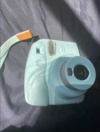 Instax mini 9 Polaroid camera comes with case as well
