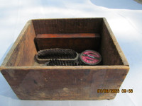 Vintage wood box with shoe shine kit