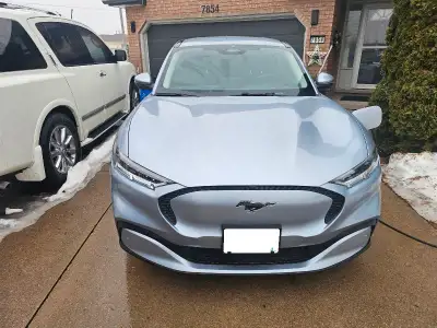 I am selling my 2022Ford Mustang Mach-E, an all-electric SUV with 98 000kilometers, offering a perfe...