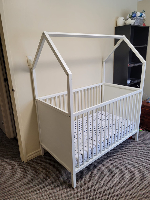 Adjustable crib - it grows with your child! in Cribs in Guelph