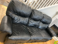 Black reclining leather couches 