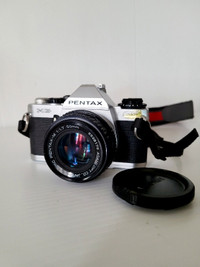 Pentax- MG SLR 35mm Film Camera W/ 50mm F/ 1.7 Lens 