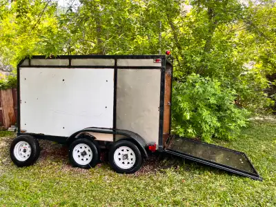 Small enclosed trailer with ramp door. Box is 8' long, 4'7" Tall, 41" wide