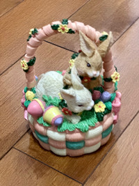 Vintage bunny figurines in flower basket 