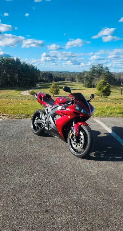 Selling my 05 r1. Hate to let it go but I'm buying a house. Clean title, small scuffs here and there...