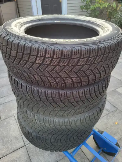 Set of Four Michelin X-ice winter tires size 225/60 R17 used only 1 season but the vehicle ( Suburu...