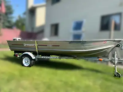 Princescraft Springbok 14' aluminum boat with 15HP Johnson motor in good condition. Comes with new t...