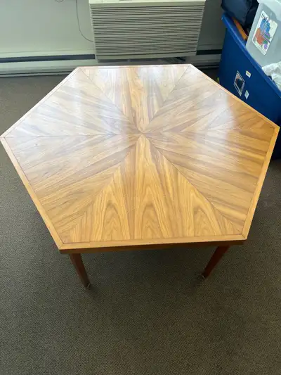 Add a touch of mid-century modern charm to your living space with this walnut hexagon-shaped coffee...