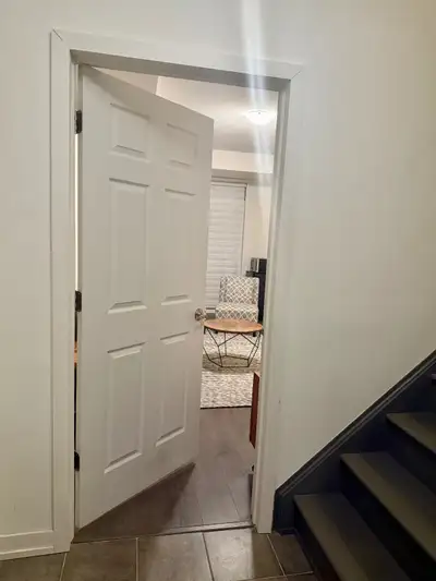 A partially furnished ground/first-floor unit with a personal living area, an ensuite, and access to...