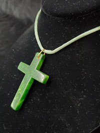 Vintage 1930's green marbleized Bakelite cross with silk cord
