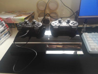 80 GB Backwards Compatible Playstation 3 + 2 Controllers + Games