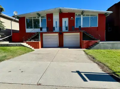 2 Beds 1 Bath with one private parking pad- Lower Unit.
