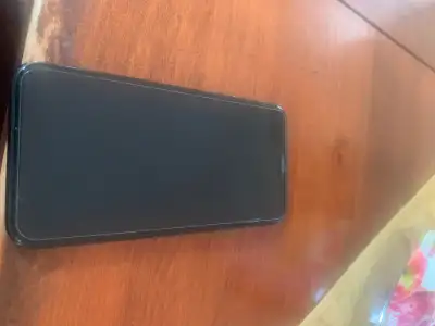 Two iPhones , working fine. No glitching. Condition like pictures . X back glass included. Price is...