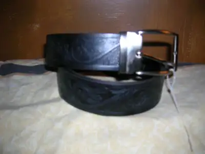 Selling a brand new never worn men's high quality Florence designer black leather belt and silver bu...