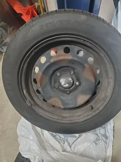 Zeta all season tires (215/55R16) (tire tread condition good at 7, 7, 8, 9/32nds) and steel rims (16...