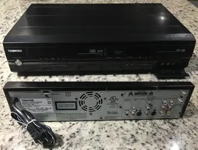Toshiba DVR7KTC2 HDMI 1080P UPCONVERSION VCR/DVD PLAYER/RECORDER, View more