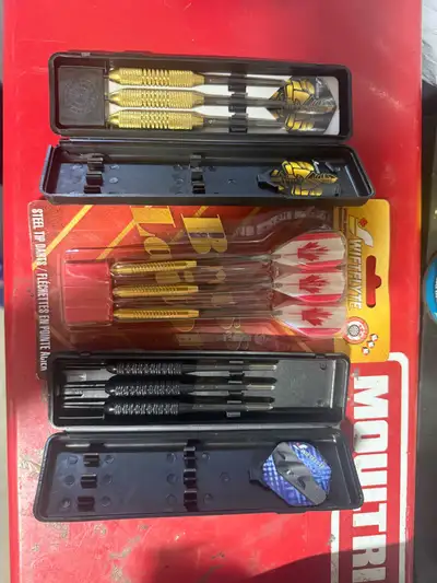 For sale is a set of three distinct steel-tip dart sets, perfect for enthusiasts looking to upgrade...