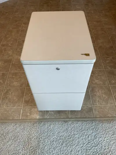 Tan 2 drawer metal storage cabinet on casters with key , View more
