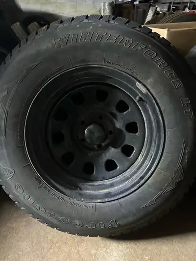 Fire Stone LT Winter Tires. Used for 2 winters. 80% tread. Mounted, Balanced and includes centre cap...