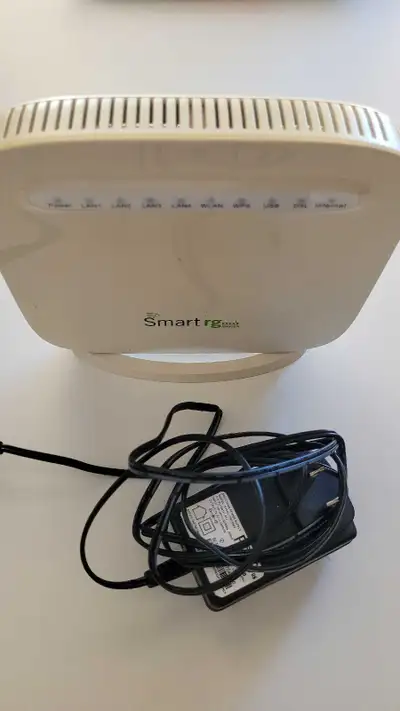 This is a used SmartRG SR505n modem that is in good working condition. It's a reliable modem perfect...