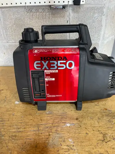 Honda EX350 generator, perfect for small power needs. It's in used condition, so expect some signs o...