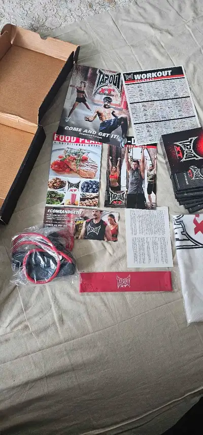 Brand new never used $45 416-857-9659 call or text Tapout XT Workout DVD Set with MMA Home Fitness T...