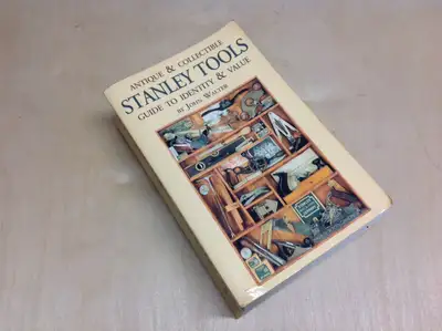 The 1996 edition of Antique & Collectible Stanley Tools guide to identity and value. Soft cover. 885...