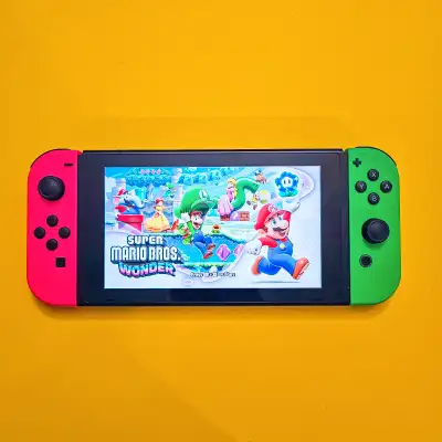Nintendo Switch Pink/Green with Case, View more
