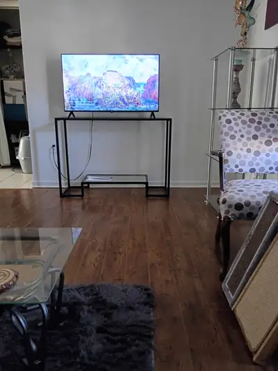 I am renting a section of my living room to a student Brand New sofa bed in living room.. everything...