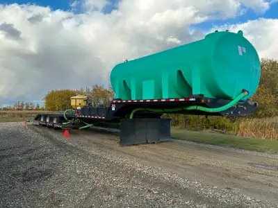 Completely rigged sprayer transporter and tender unit. Comes with everything needed to haul and nurs...