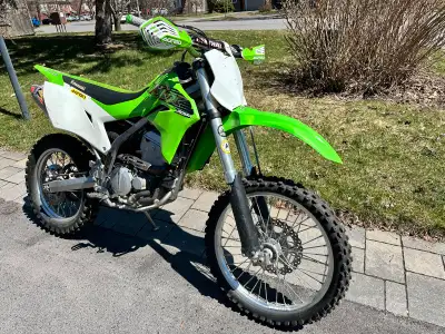 Looking to sell my 2020 Kawasaki KLX 300R, a versatile dirt bike perfect for trails and off-road adv...