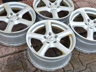set of four 17-inch alloy magwheels with a 5x120mm bolt pattern, Off a GMC pickup truck Will fit any...