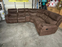 Sectional reclining couch with cup holder