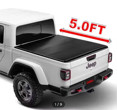 I am selling this brand new hard tri-fold tonneau cover designed specifically for a 5ft bed on a 202...